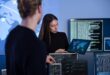 Cyber security team working in a Cyber Security Operations Center SOC to protect systems and