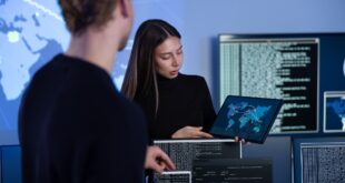Cyber security team working in a Cyber Security Operations Center SOC to protect systems and