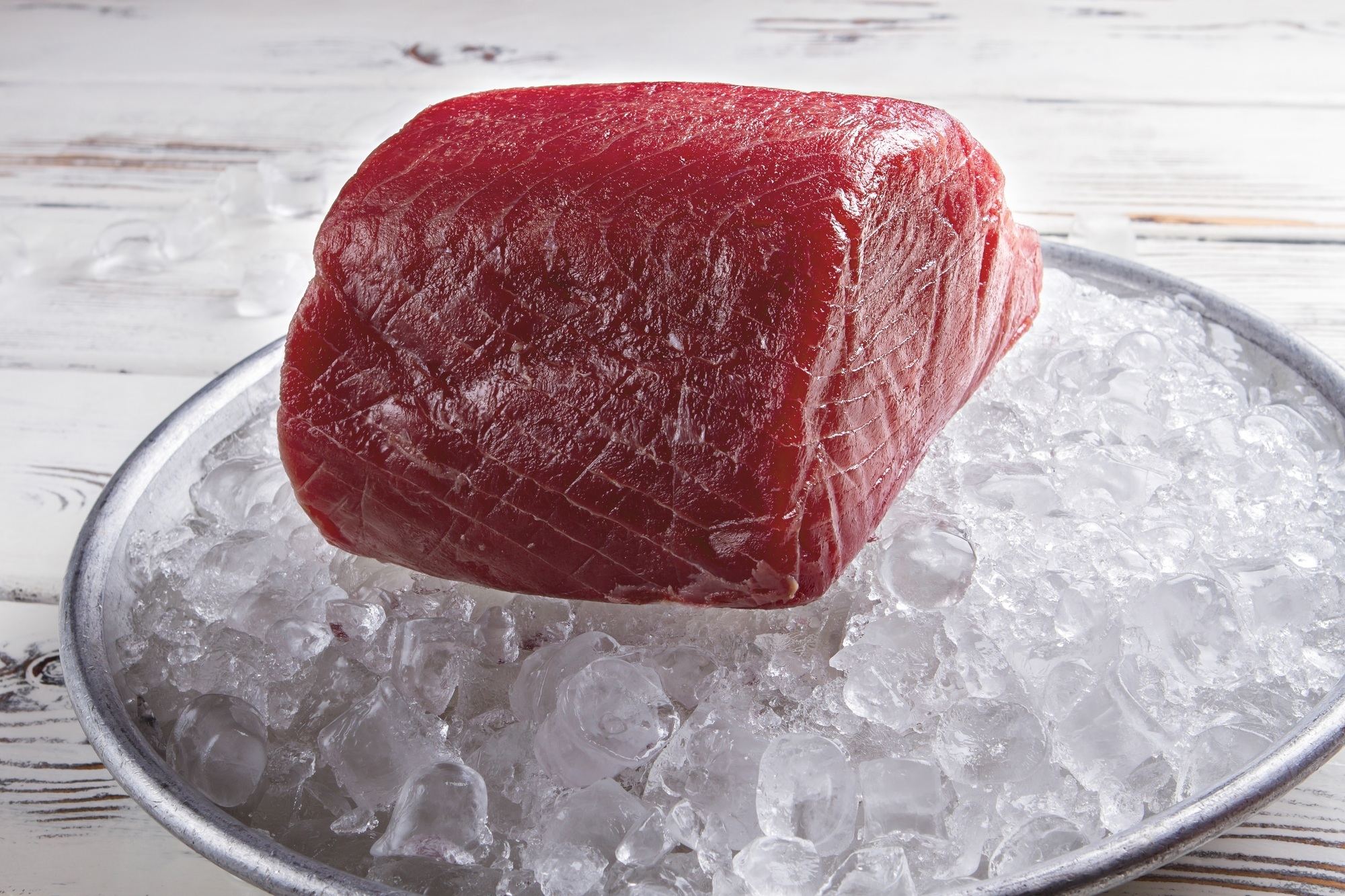 Raw fish meat on ice