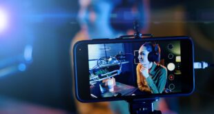 Young woman streaming a live video